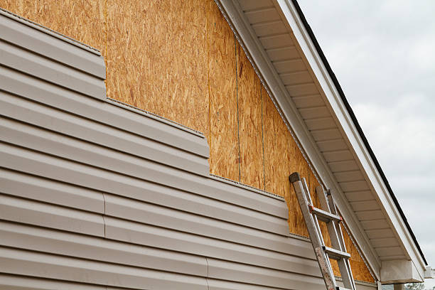 Professional Siding Contractor technician working in Baden, MD